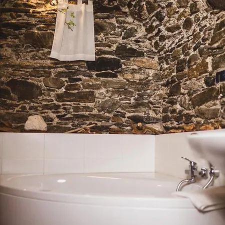 Апартаменты Montemezzo Le In Pietra *